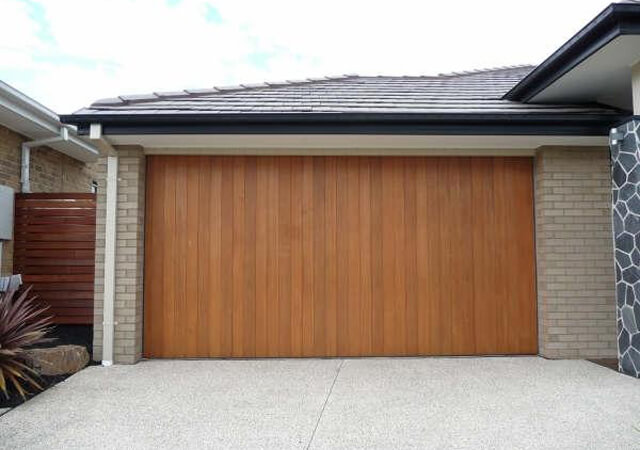 Vertically Clad Western Red Cedar Tilt Panel Lift Garage Door