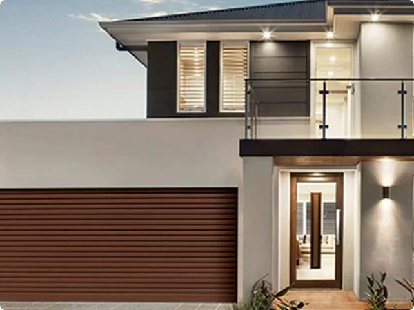Gliderol sectional garage door complementing modern home exterior in Dandenong, VIC.