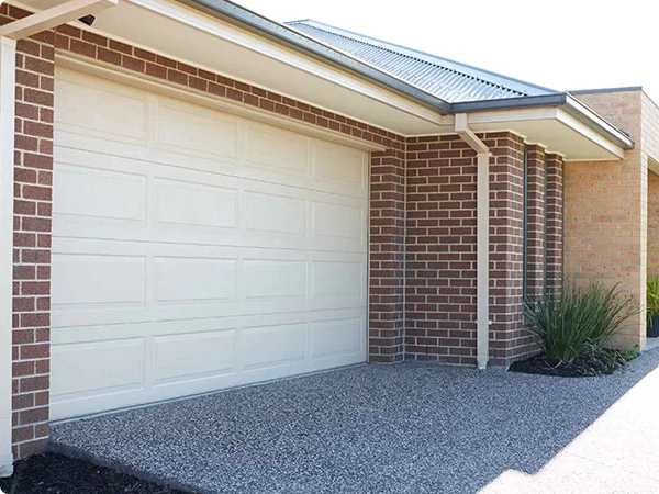 Gliderol sectional garage door installed on a brick home in Dandenong, VIC.