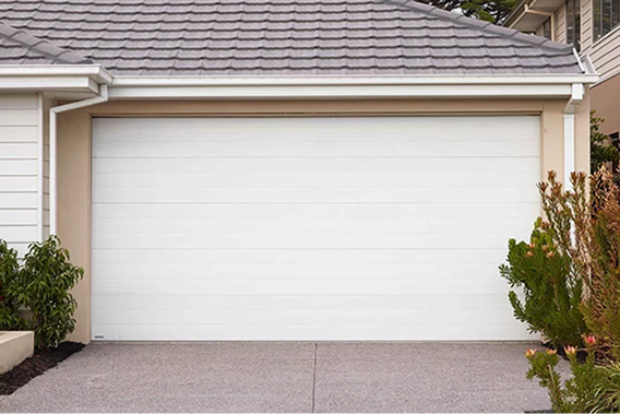Gliderol sectional overhead garage door installed on a modern home with Colorbond steel finish.